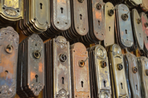 Painted-over door hinges and hardware? Learn how professional restoration safely strips old paint to reveal the original finish underneath.